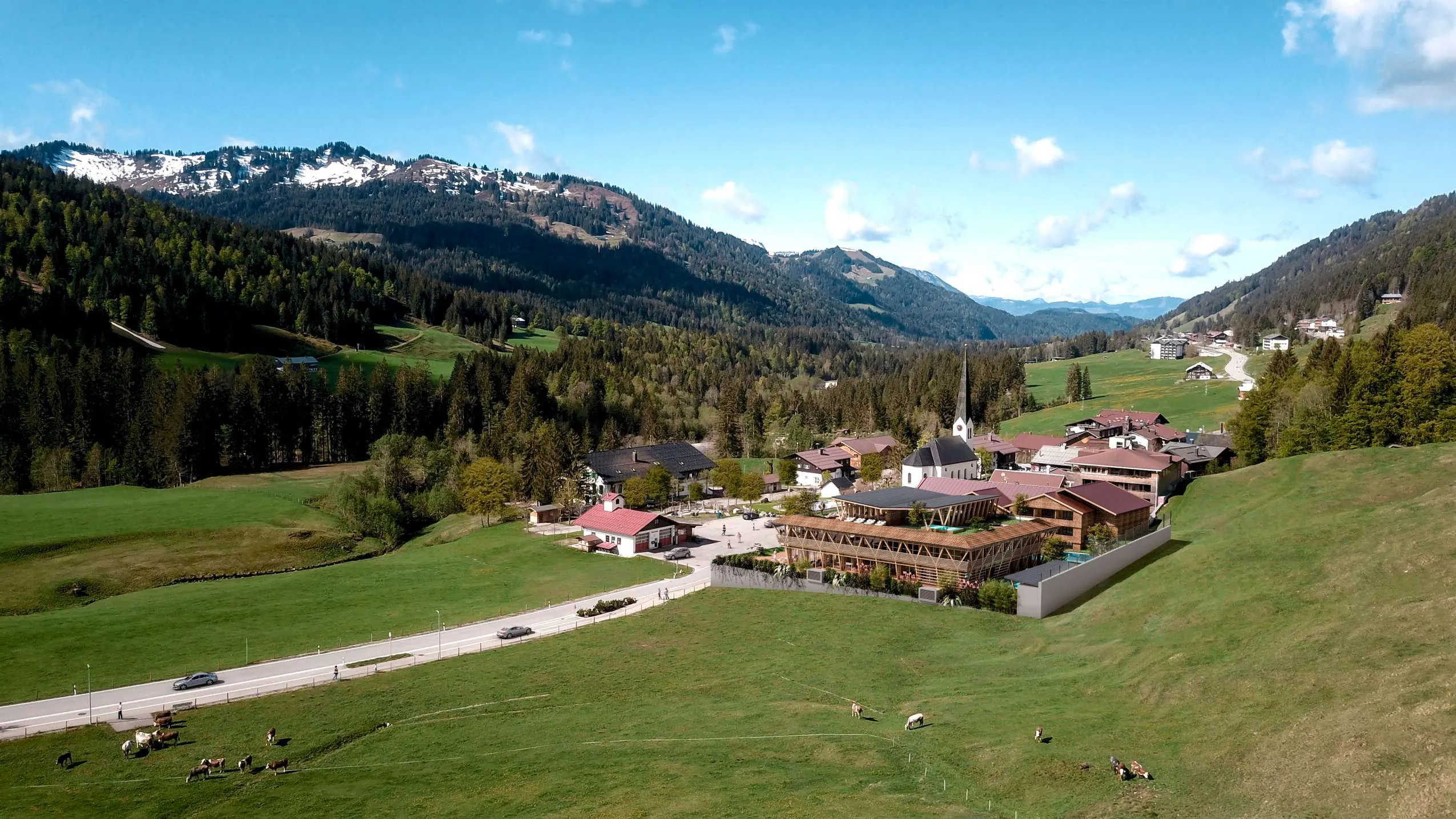 Außenansicht auf das Hubertus Mountain Refugio Allgäu in Balderschwang mit Bergpanorama