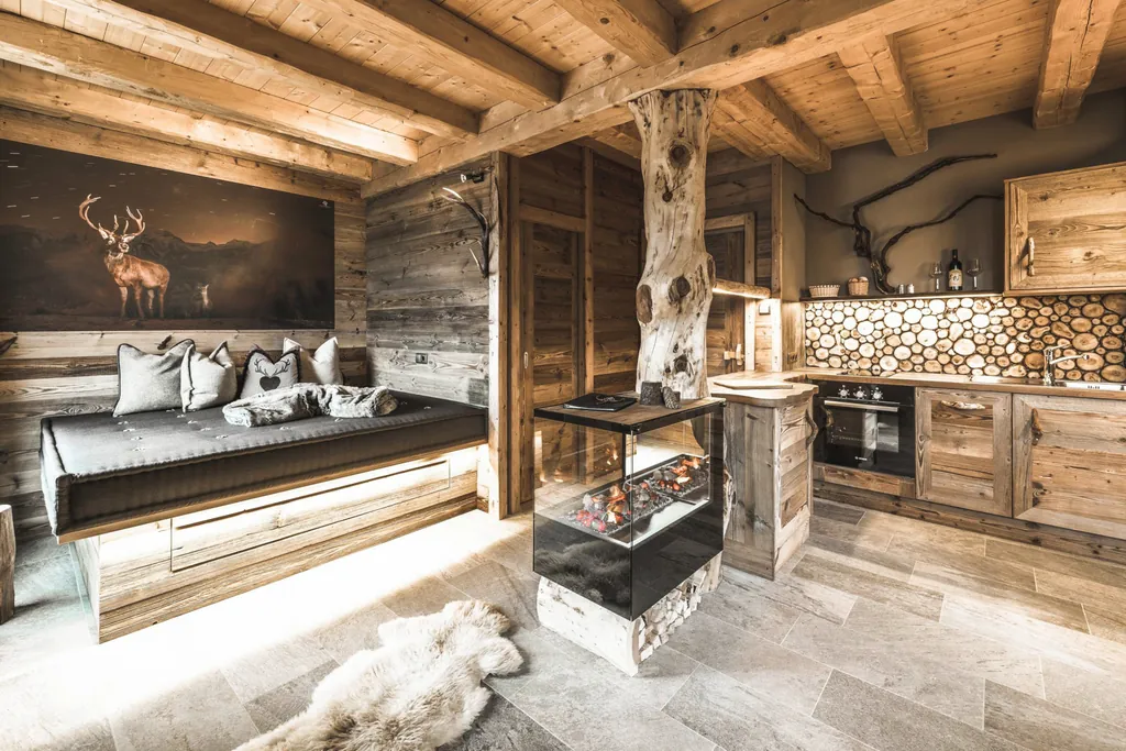 Modern eingerichteter Wohnraum im Chalet Resort ZU KIRCHWIES im alpinen Stil mit vielen Holzelementen