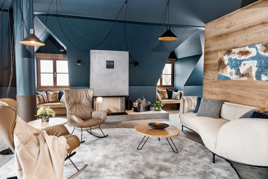 Luxuriöse Suite im A-ROSA Kitzbühel mit eigenem Kamin und Sitzbereich