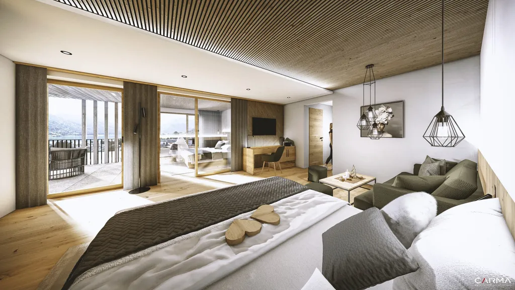 Kuschel-Suite-Deluxe in Naturtönen mit Sofa und Balkon im Familienresort Buchau