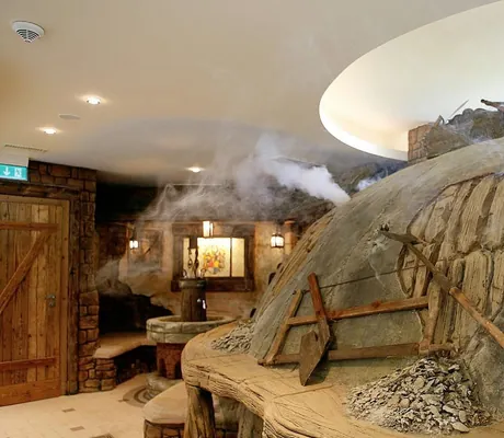 Kohlenmeile im Wellnessbereich des Wellnesshotel Tanne mit aufsteigendem Rauch