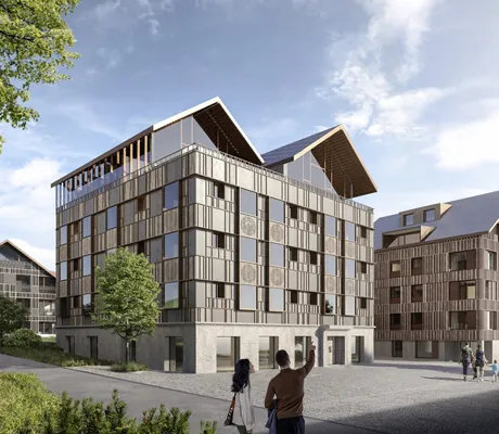 Außenansicht Huus Quell mit verschiedenen Motiven regionalen Handwerks an der Fassade
