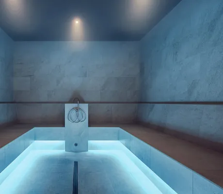 grau gefliestes Dampfbad im Landromantikhotel Oswald in blauem Licht